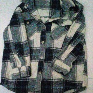 A Boy's  Long Sleeve Plaid Button Up Shirt